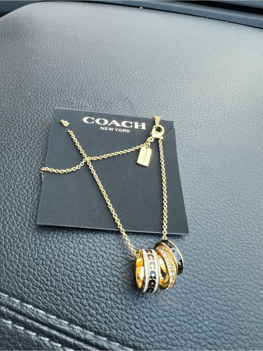COACH Gold-Tone Interlocking 3 Ring Necklace